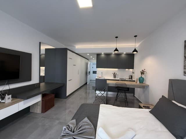 Apartment with Turkish title deed for sale in a gated community with a pool at İskele Long Beach