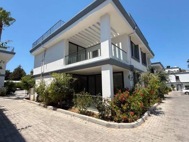 TWIN VILLA FOR SALE IN A POOL COMPLEX IN THE HEART OF KYRENIA