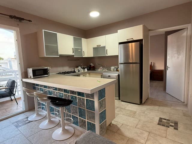 CLEAN APARTMENT FOR RENT ON THE MAIN STREET IN KYRENIA CENTER